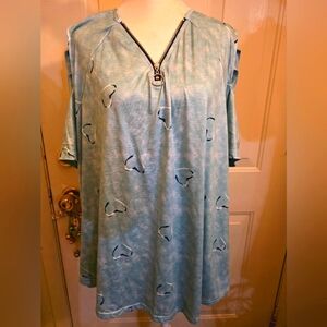 Plus size top with zipper detail.